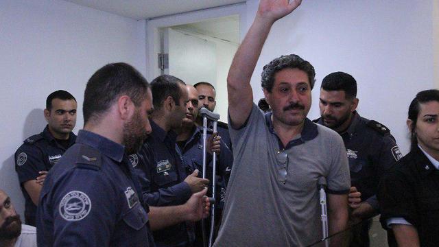 Jafar Farah at Sunday's hearing, which he attended on crutches (Photo: Zohar Shachar)