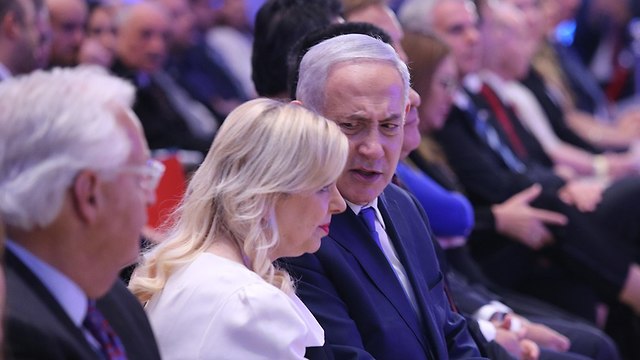 PM Netanyahu with his wife, Sara (Photo: Alex Kolomoisky)