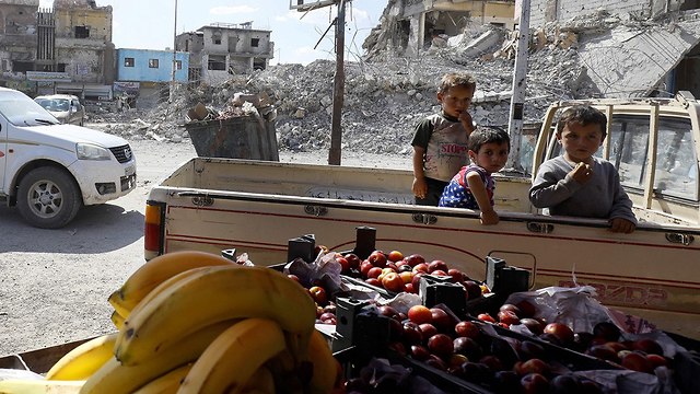 רמדאן א-רקה רקה בירת דאעש סוריה (צילום: AFP)