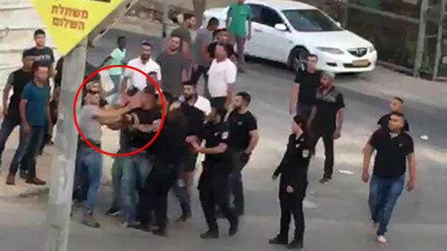 The incident with the policeman's slap (circled)