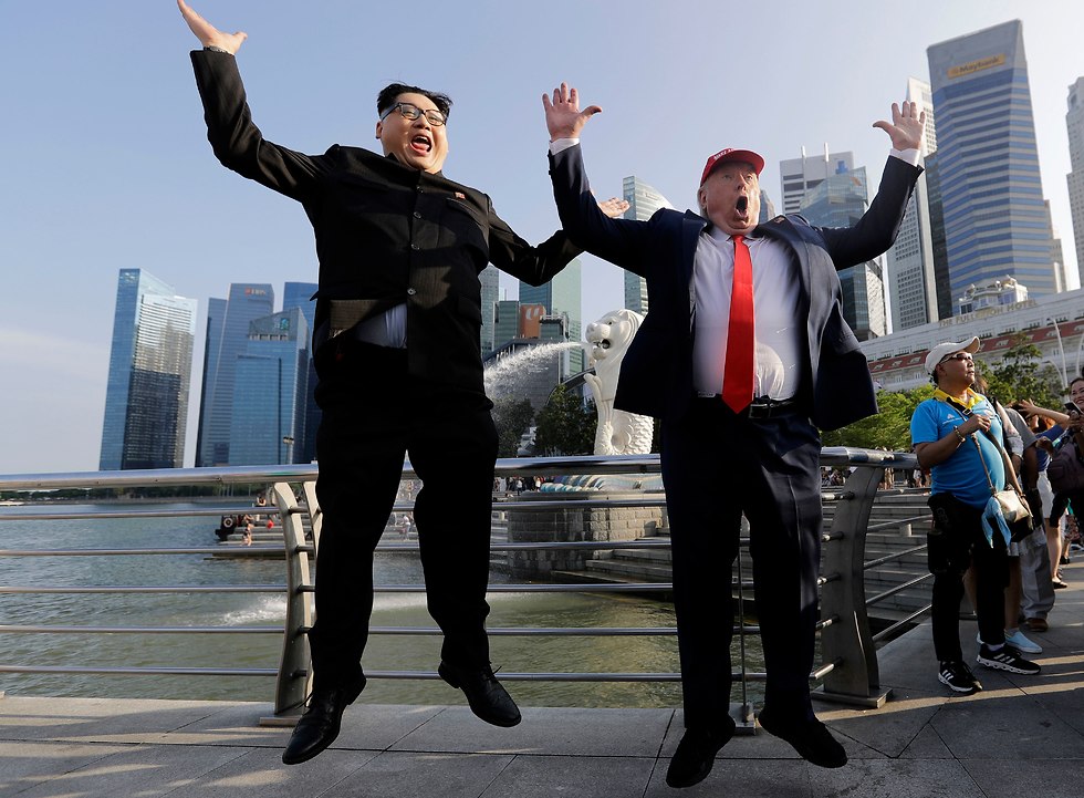 דונלד טראמפ וקים ג'ונג און (צילום: AP)