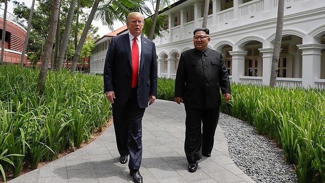 דונלד טראמפ עם קים ג'ונג און (צילום: AP)