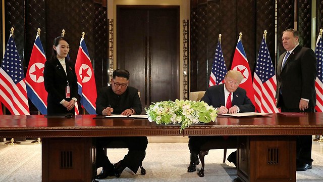 Trump and Kim sign the joint statement (Photo: Reuters)