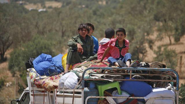 Беженцы на границе. Фото: AFP
