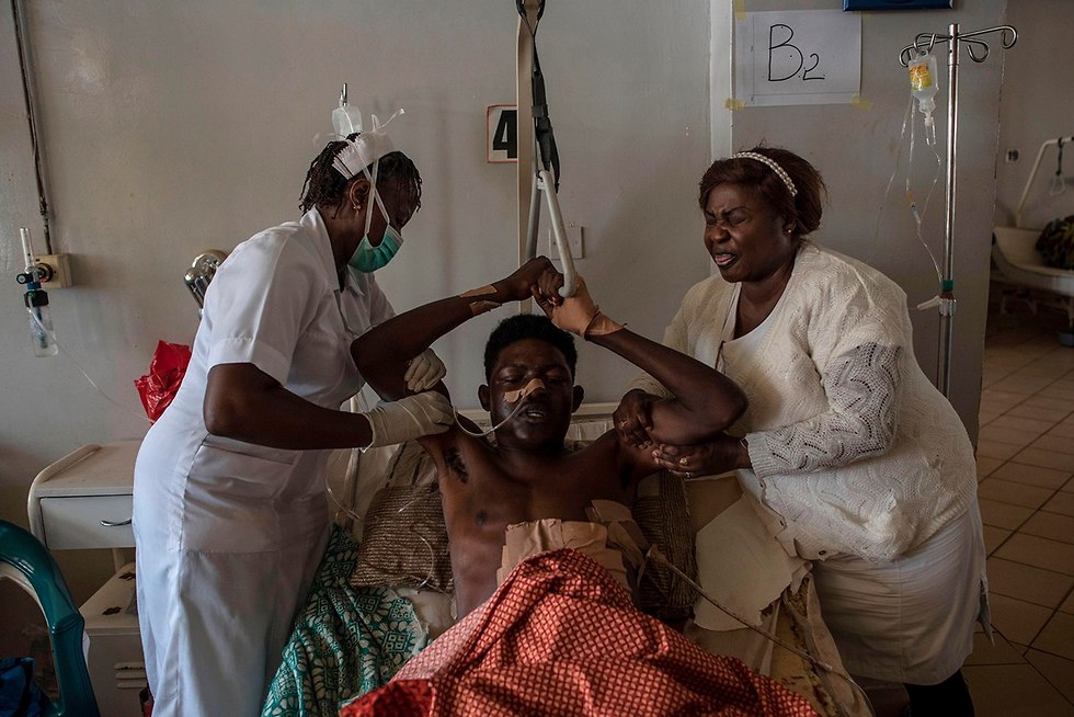 פצועי העימותים בין תושבים נוצרים לנוודים מוסלמים בניגריה (צילום: AFP)