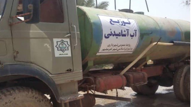 חלוקת מים מחסור ח'וראמשהר מחאה ב איראן מחמרה ()