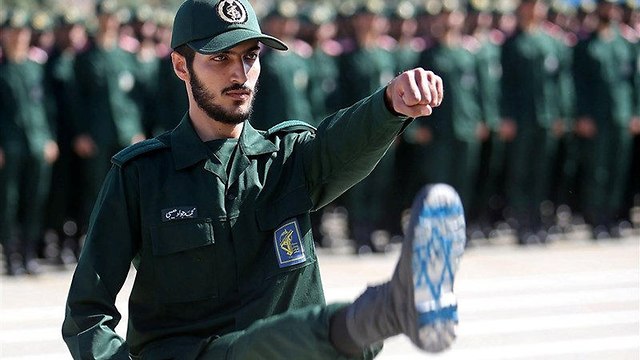 An Iranian soldier shows off the Israeli flag drawn on the sole of his shoe (Photo: Reuters) (Photo: Reuters)