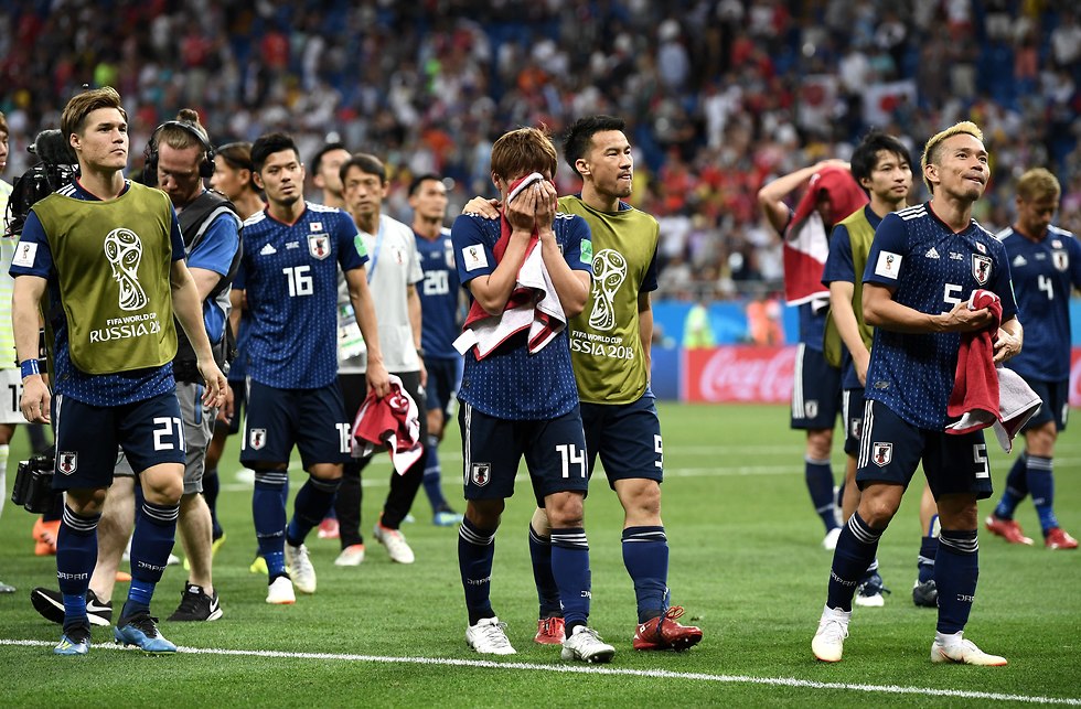 שחקני נבחרת יפן מאוכזבים (צילום: getty images)