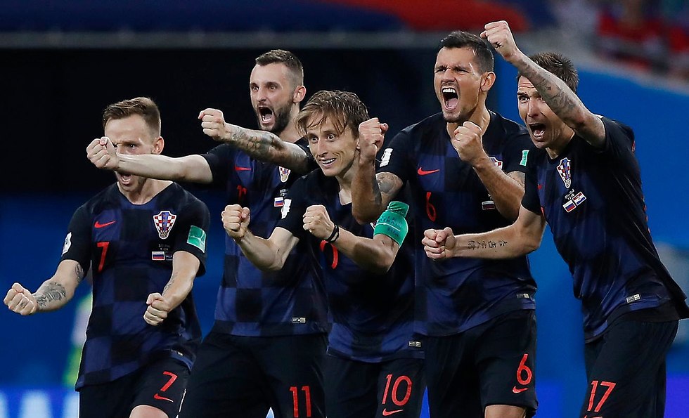 Сборная Хорватии празднует выход в полуфинал.  Фото: AP