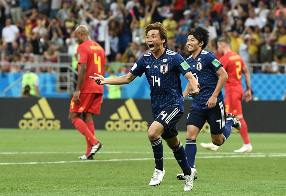 נבחרת יפן ברגע מרגש של ניצחון (צילום: Carl Court/GettyimagesIL)