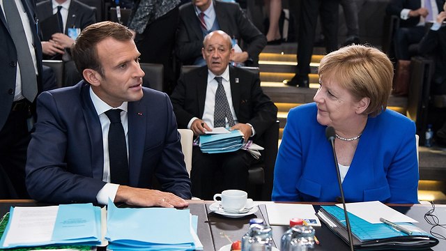French President Macron with German Chancellor Angela Merkel (Photo: MCT)