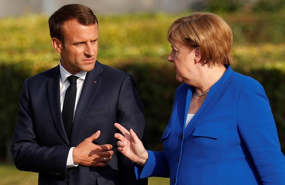 German Chancellor Merkel and French President Macron (צילום: רויטרס)
