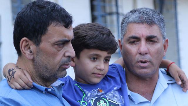 Karim with his father Jabar, left (Photo: Avi Mualem)