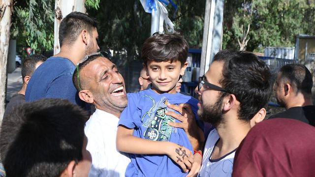 Karim embraced by relatives (Photo: Avi Mualem)