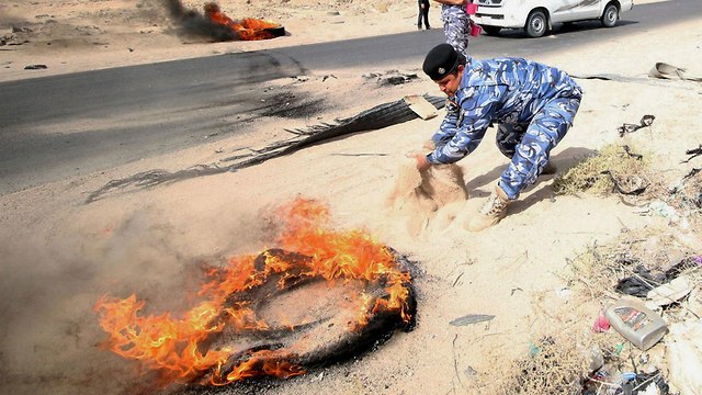 עיראק הפגנות בבצרה נגד השלטון ואיראן (צילום: רויטרס)