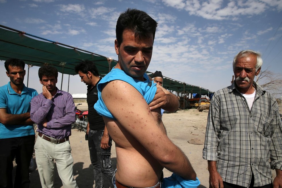 חקלאי נפצע בהפגנות ב איראן בצורת מחסור במים (צילום: AP)