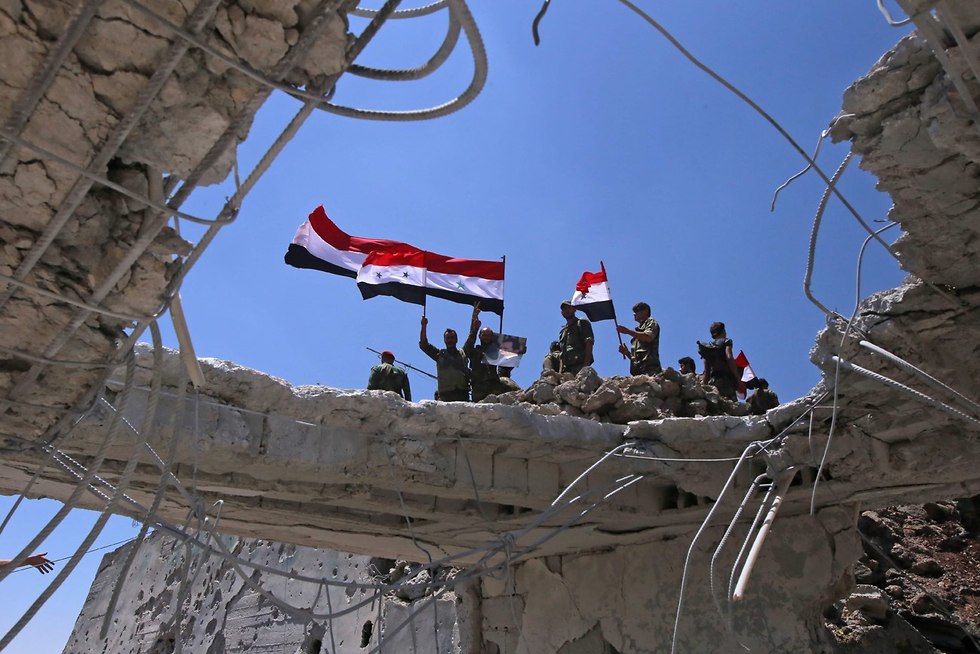 כוחות פרו סוריים במחוז קוניטרה דרום סוריה  (צילום: AFP)
