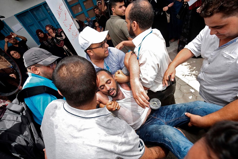 Демонстрация у штаб-квартиры UNRWA в Газе. Фото: AFP (צילום: AFP)