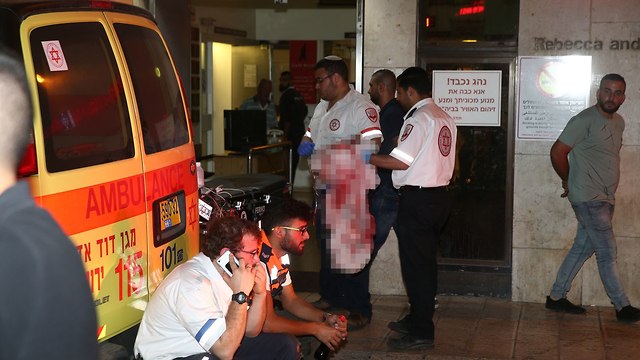 MDA paramedics treating the wounded (Photo: Ohad Zwigenberg)