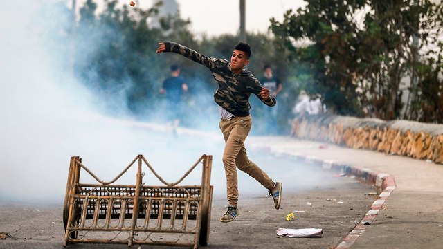 Clashes in Kobar (Photo: AFP)