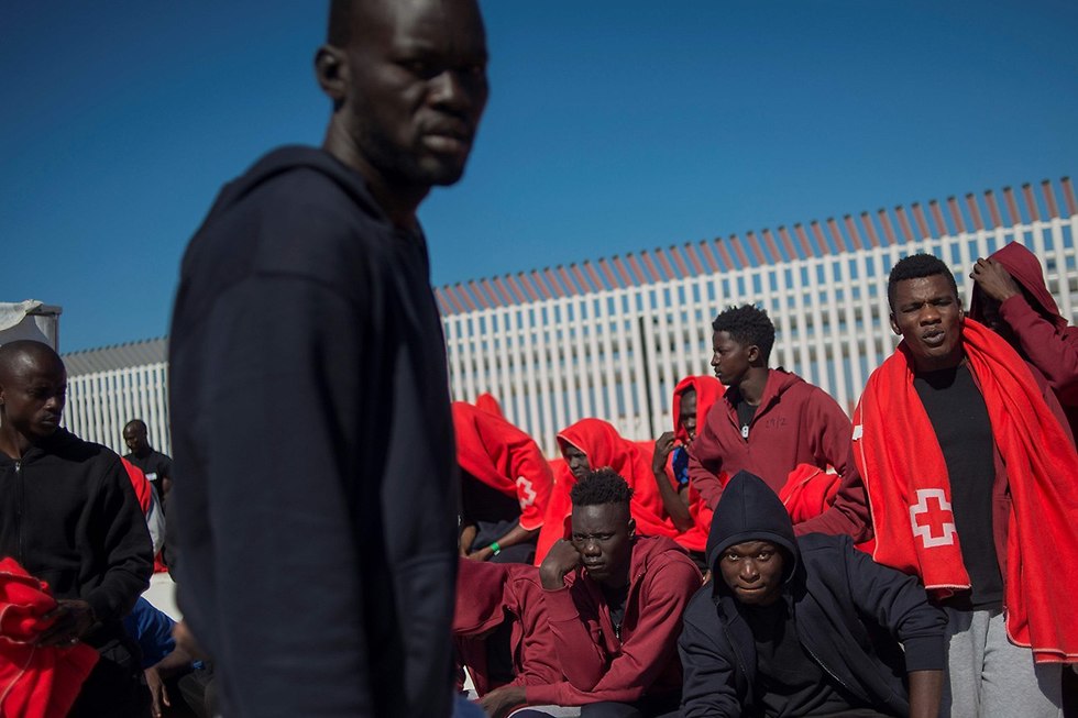 מהגרים בספרד (צילום: AFP)