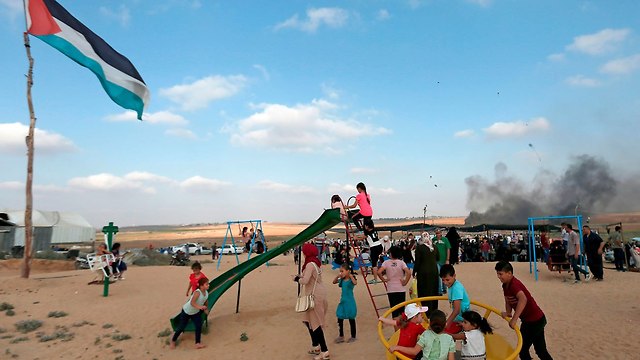 Дети, используемые террористами ХАМАСа в качестве живого щита. Фото: AFP (Photo: AFP)