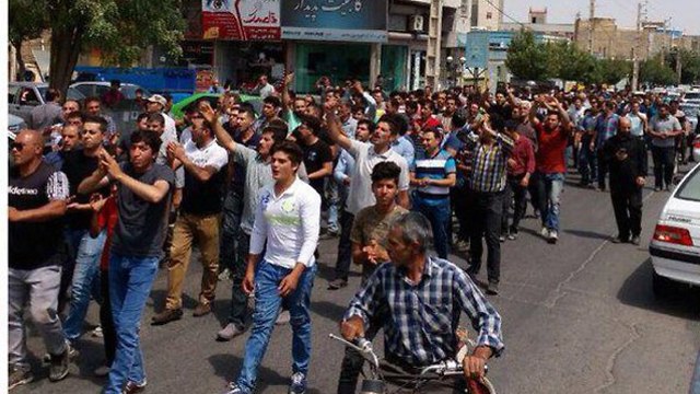 Iranians protest economic hardship