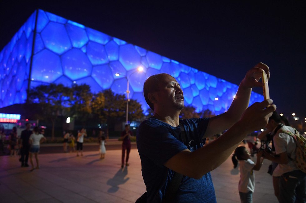 אצטדיון קן הציפור בייג'ינג עשור לאולימפיאדת 2008 ב סין (צילום: AFP)