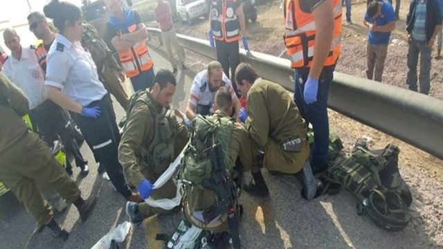 IDF forces treat car accident victim in West Bank (Photo: The Media Line)