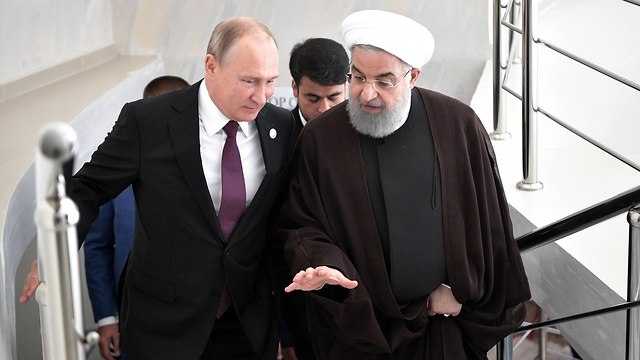 Vladimir Putin and Iranian President Hassan Rouhani (Photo: MCT)
