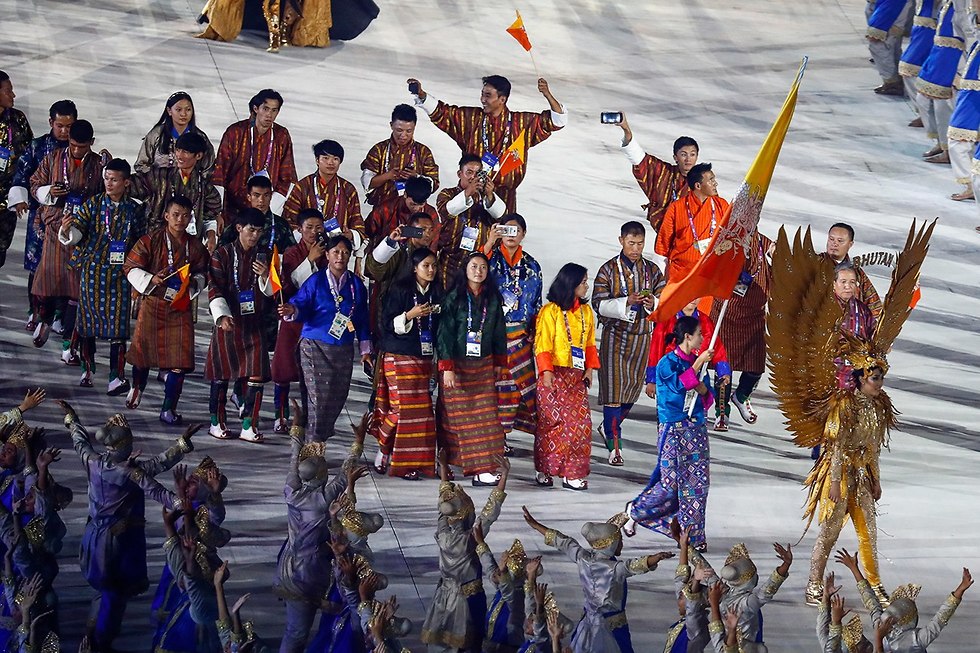 בהוטן משחקי אסיה מדליה המאושרת בעולם (צילום: EPA)