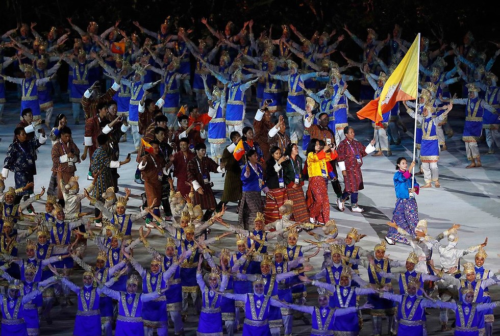 בהוטן משחקי אסיה מדליה המאושרת בעולם (צילום: רויטרס)