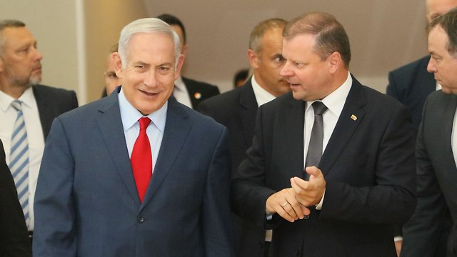 PM Saulius Skvernelis with PM Netanyahu (Photo: AFP)