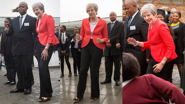 ראש ממשלת בריטניה תרזה מיי רוקדת דרום אפריקה מייבוט (צילום: רויטרס, MCT, AFP)