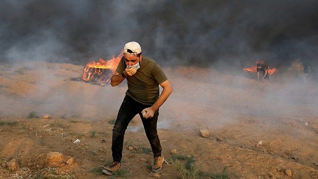 מהומות פלסטינים בגבול רצועת עזה (צילום: רויטרס)
