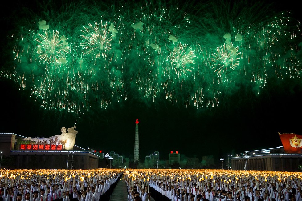 חגיגות בצפון קוריאה (צילום: AP)