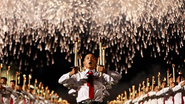 חגיגות בצפון קוריאה (צילום: EPA)