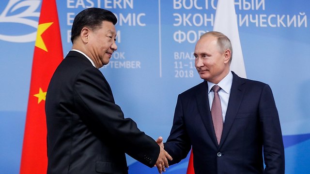 נשיא רוסיה ולדימיר פוטין עם נשיא סין שי ג'ינפינג  (צילום: רויטרס)