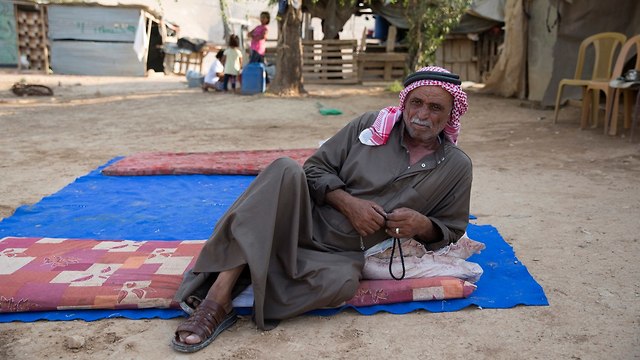A resident of the Bedouin village (Photo: Amit Shabi)