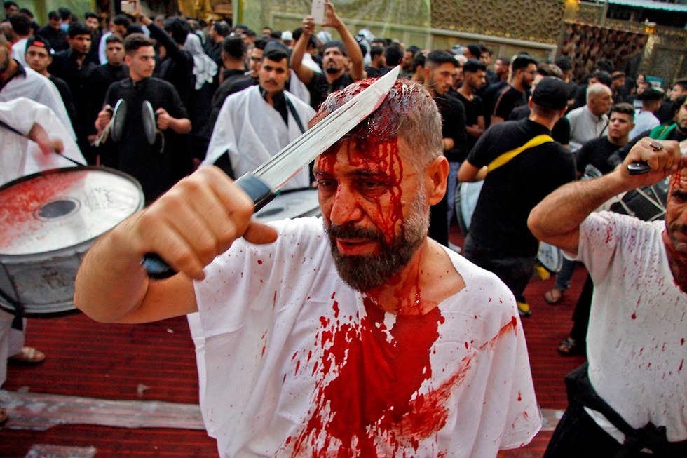 יום ה עשוראא מוסלמים שיעים נג'ף עיראק (צילום: AFP)