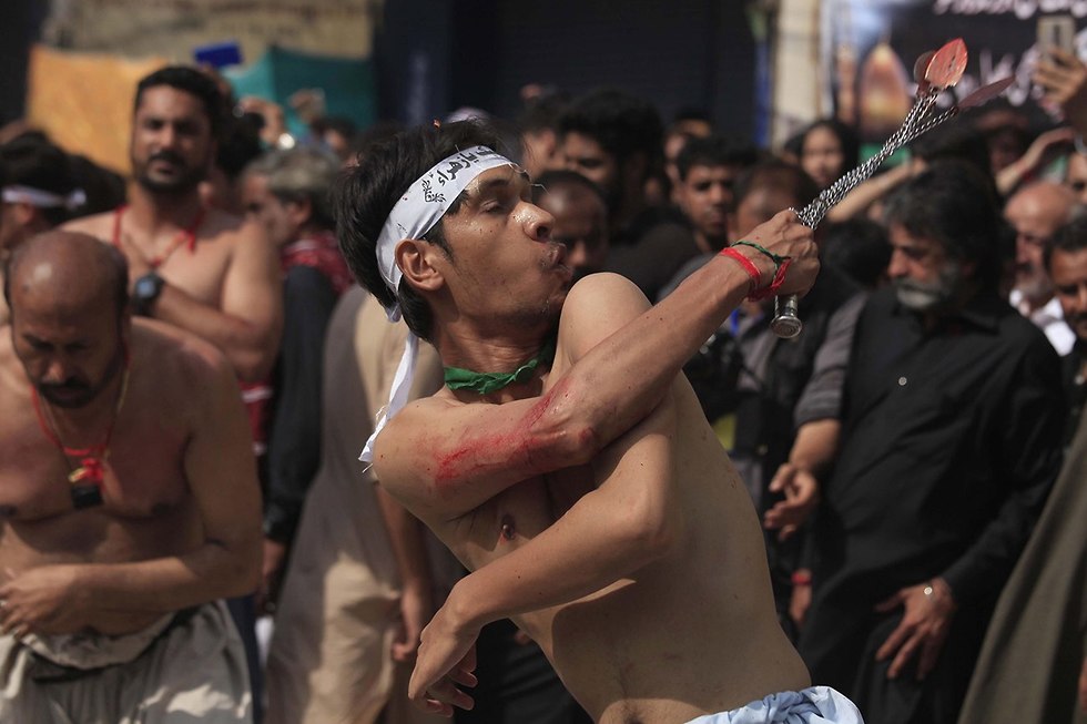 יום ה עשוראא מוסלמים שיעים פשוואר פקיסטן (צילום: EPA)