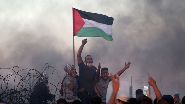 הפגנות התפרעויות פלסטינים גדר עזה (צילום: רויטרס)
