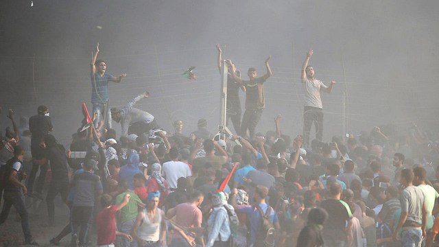 מהומות פלסטינים גדר עוטף עזה (צילום: רויטרס)