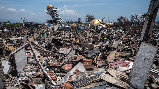 סיוע לאחר רעידת האדמה באינדונזיה (צילום: gettyimages)