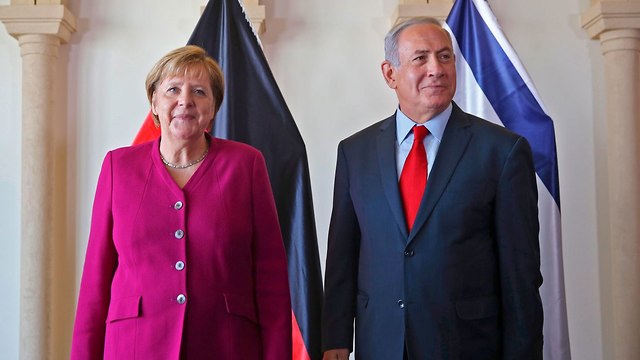 German Chancellor Angela Merkel and PM Netanyahu  (Photo: AFP)