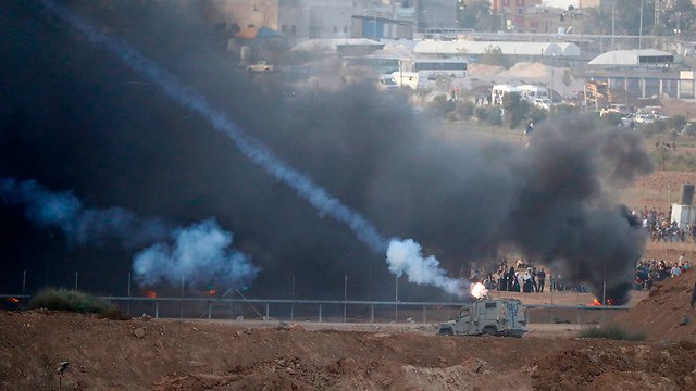 התפרעויות של פלסטינים ברצועת עזה (צילום: AFP)