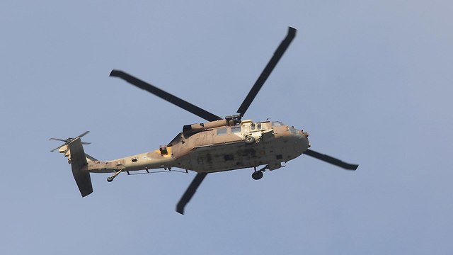 Армейский вертолет над Барканом. Фото: EPA