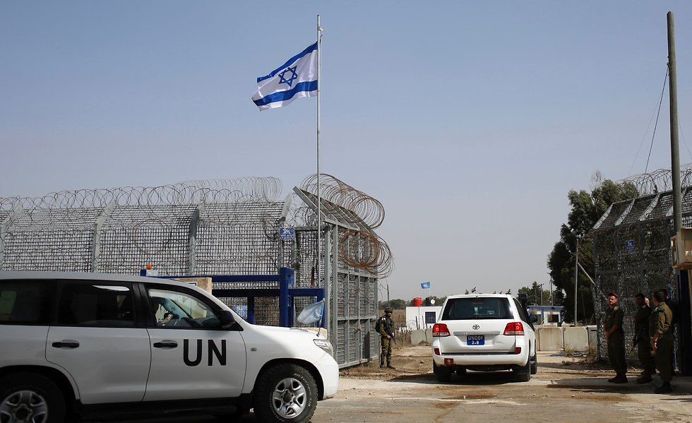 UN forces return to Syria through the Quneitra crossing (Photo: AP)