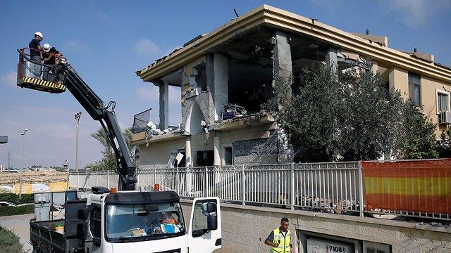 Photo: Home in Be'er Sheva hit by  a rocket launched from Gaza  (Photo: Reuters)