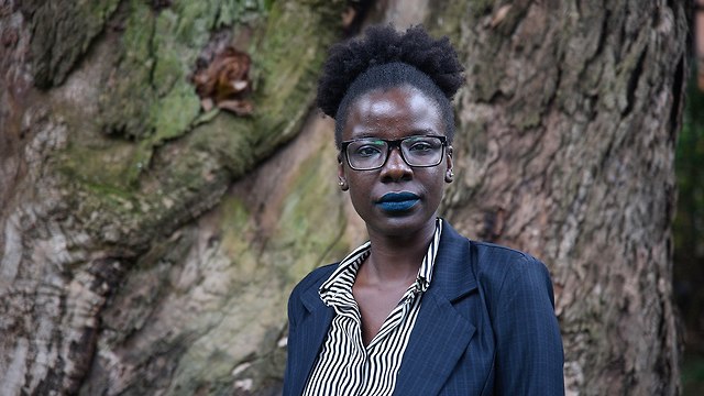 מוניקה גודיבה אקולו עורכת דין פעילה חברתית ב אוגנדה (צילום: AFP)